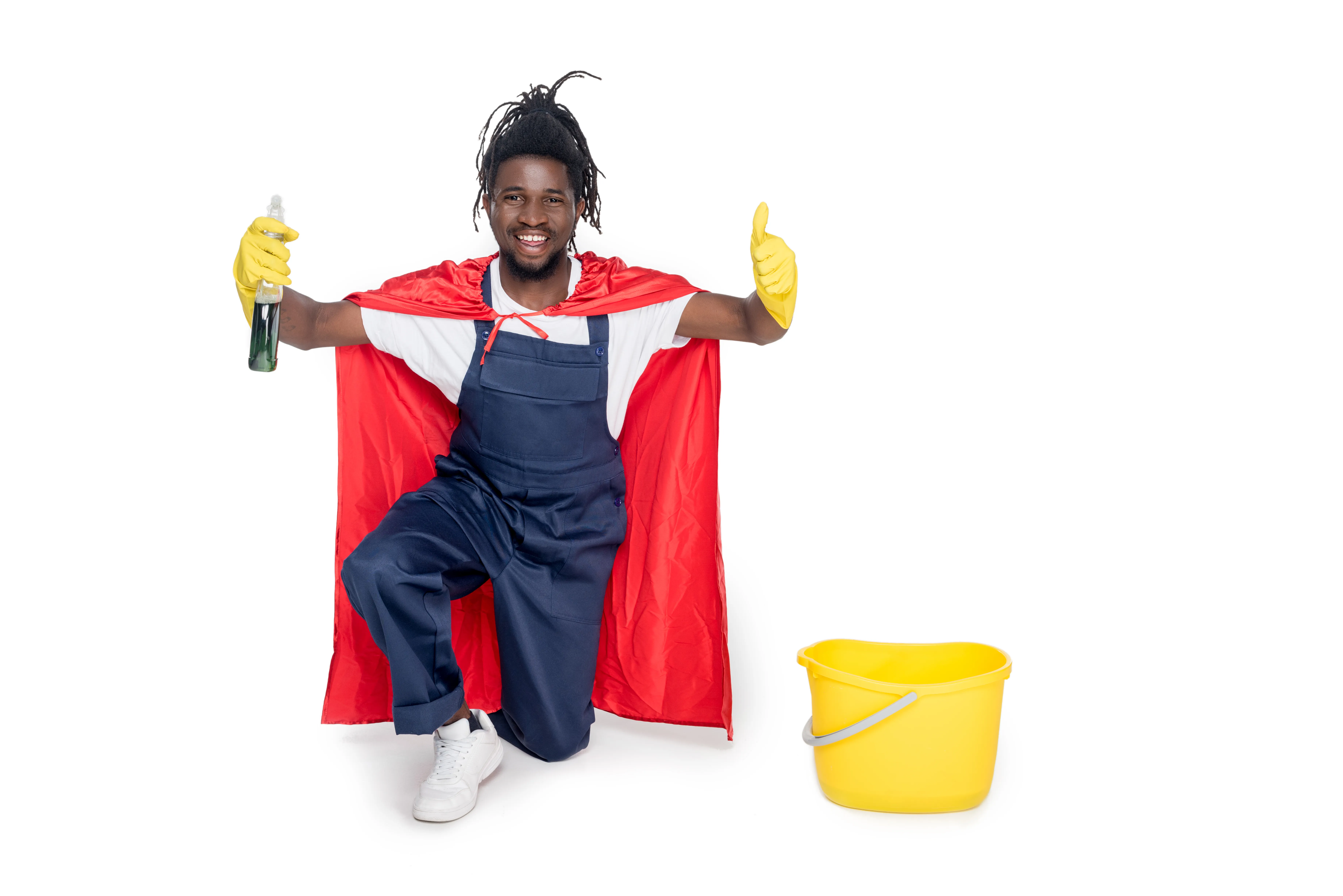 smiling african american superhero cleaner in rubber gloves holding spray bottle